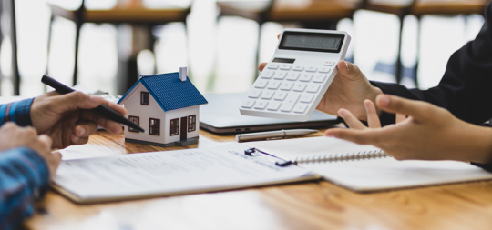 Businessmen, real estate agents discuss house purchase prices, fee, mortgage, interest, rent, cash flow, loan.